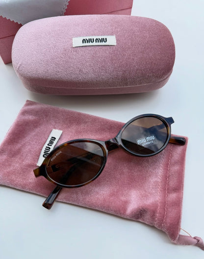 Miu miu sunglasses round