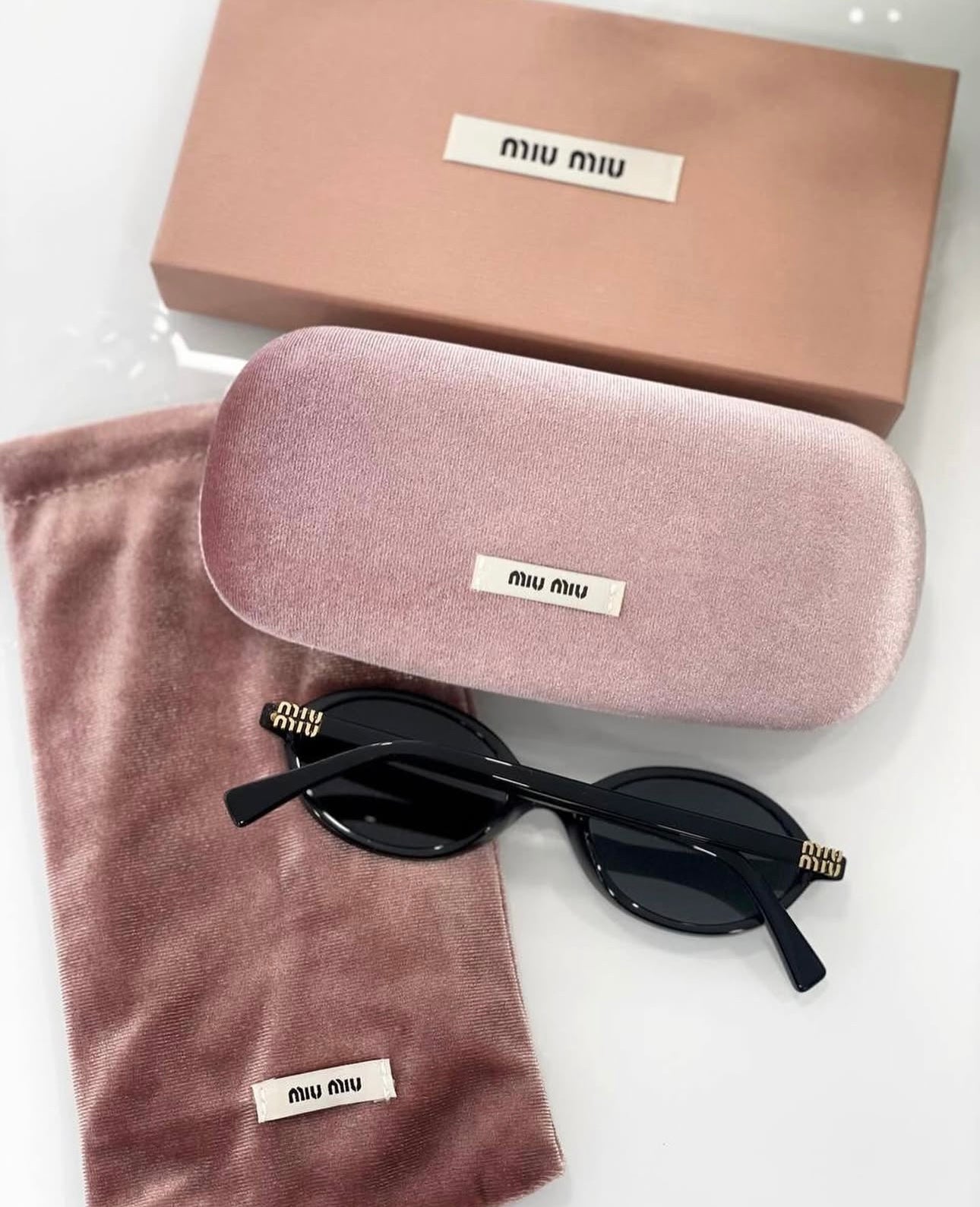 Miu miu sunglasses round