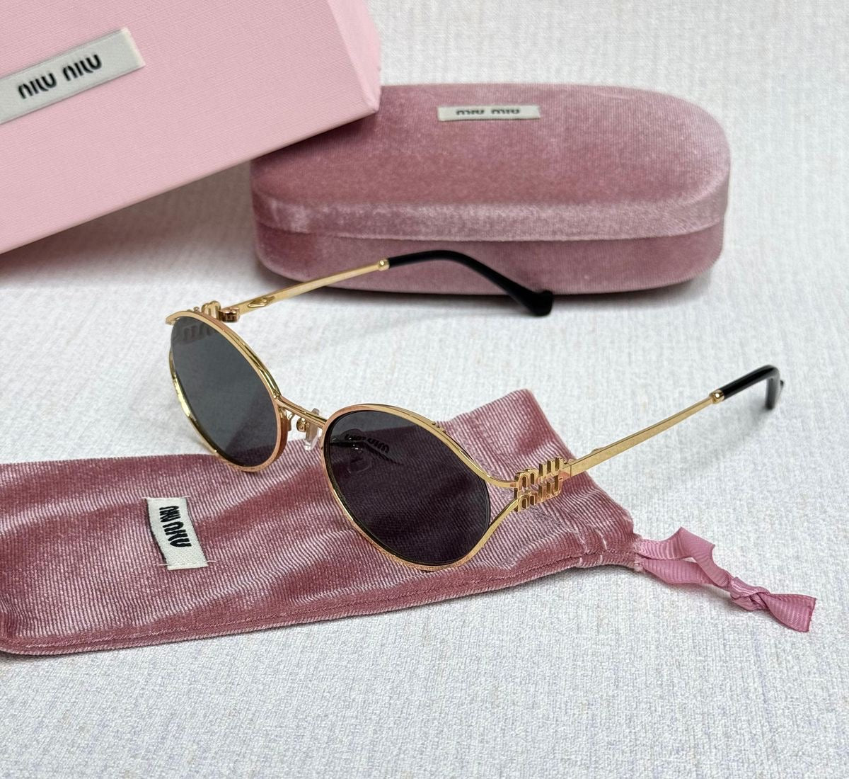 Miumiu oval sunglasses