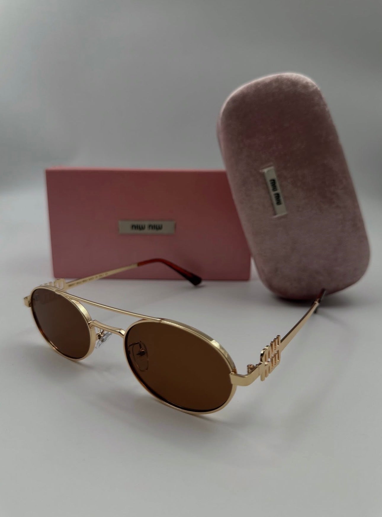 Miu miu sunglasses bridge