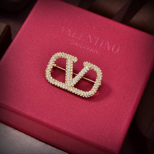 Valentino broche