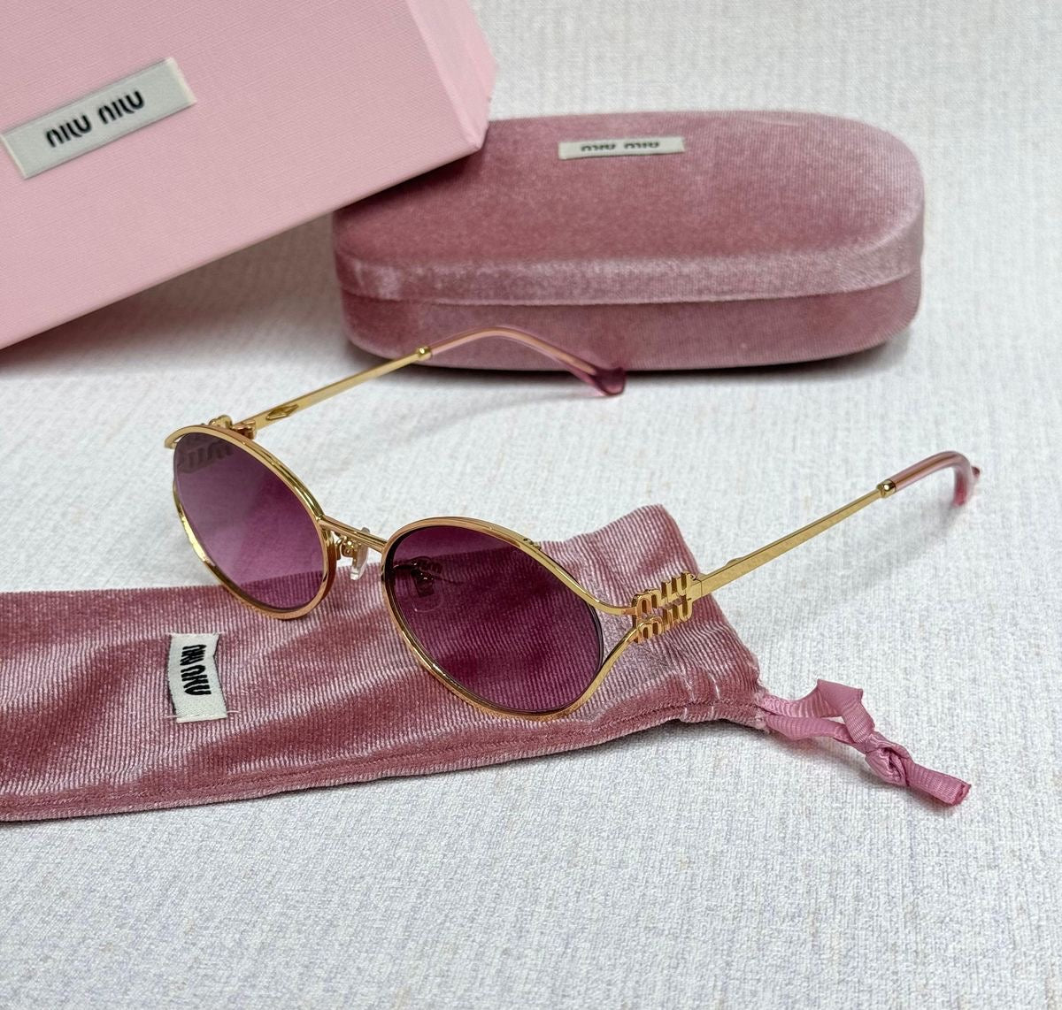 Miumiu oval sunglasses