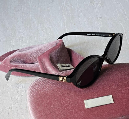 Miu miu sunglasses round