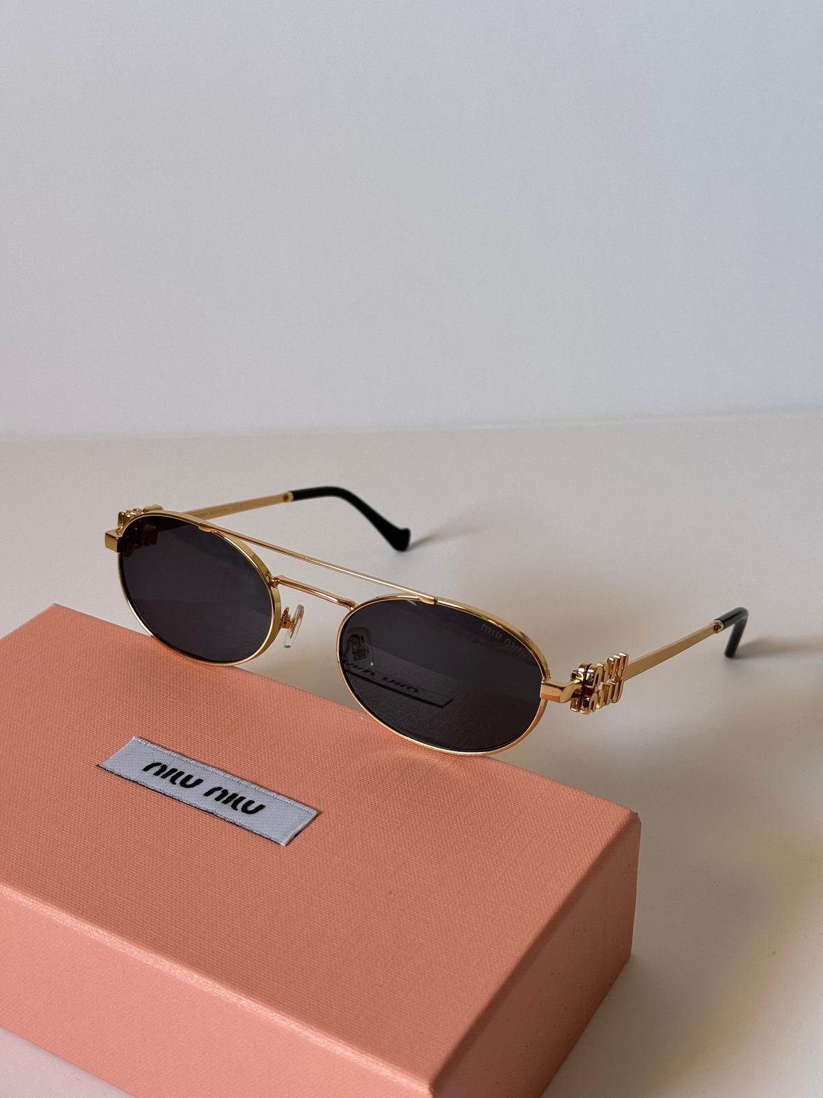 Miu miu sunglassws birdge