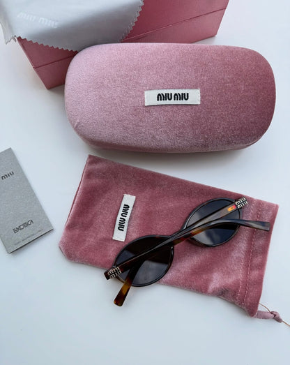 Miu miu sunglasses round