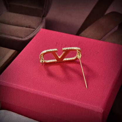Valentino broche