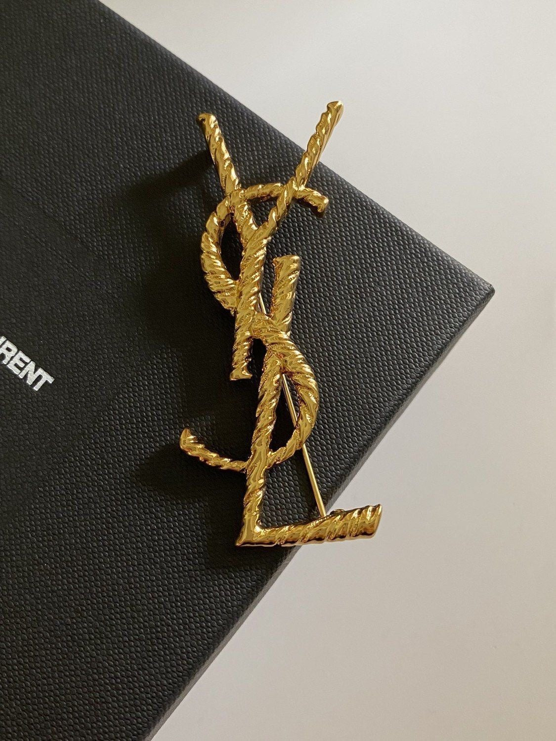 Ysl broche gold plated